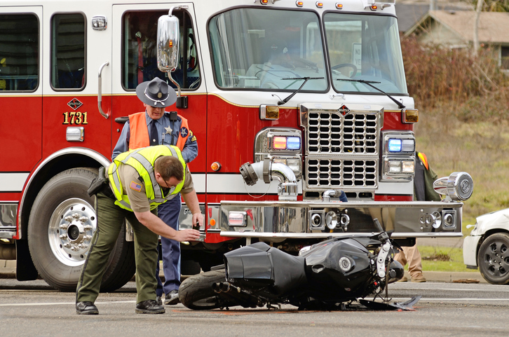 California CHP is working on an accident report at a motorcycle accident scene in Long Beach.